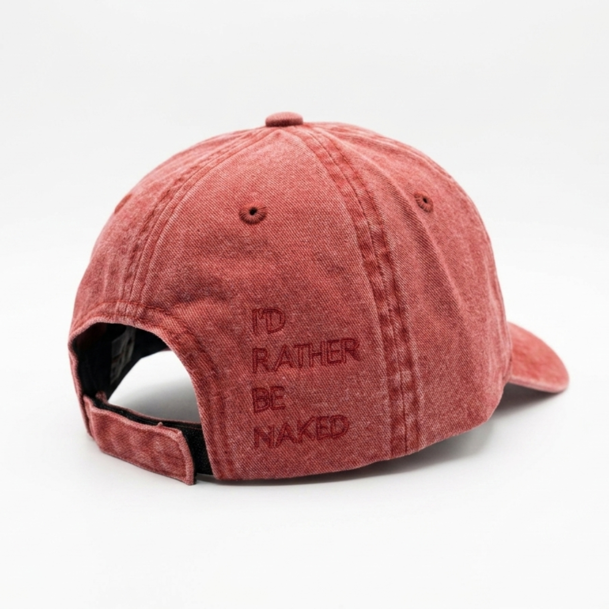 IRBN Cap in Lava Falls red — close up of 3D embroidered figure mark, stone wash texture