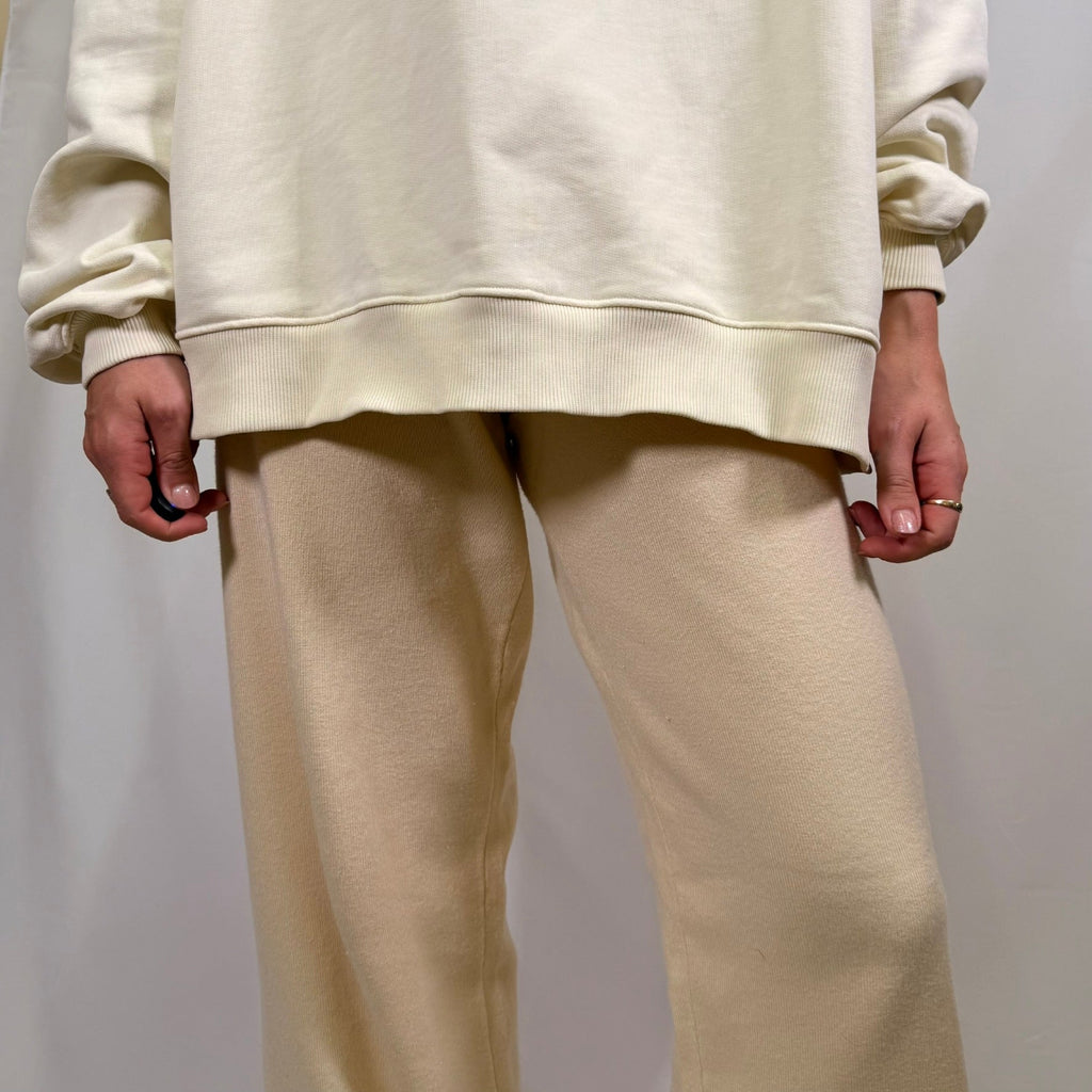 IRBN mock neck sweatshirt in Cannoli Cream, full length view showing relaxed oversized fit