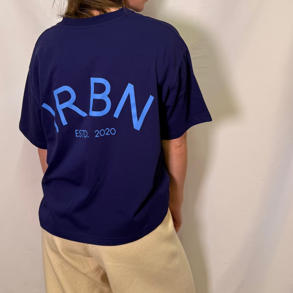 IRBN boxy t-shirt in Navy, back full view showing IRBN ESTD. 2020 arched print in blue, 250gsm GOTS-certified organic cotton