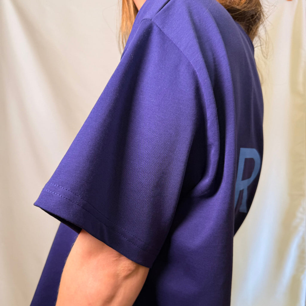 IRBN boxy t-shirt in Navy, side view showing boxy oversized fit and dropped shoulder, 250gsm organic cotton
